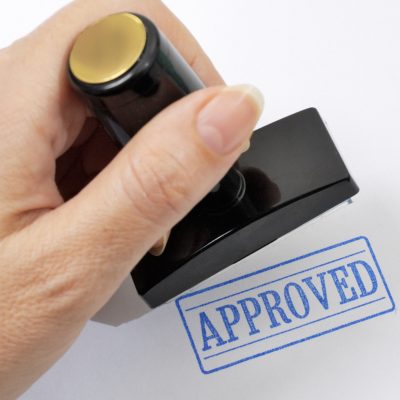 Rubber stamp in a hand